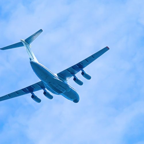 airplane-in-blue-sky-air-cargo-transportation-pl-2022-06-29-08-11-25-utc